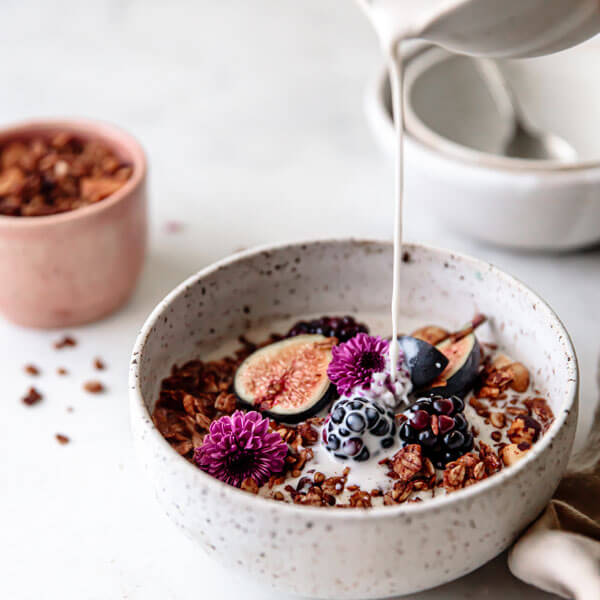 a bowl of vegan Chocolate Hazelnut Granola