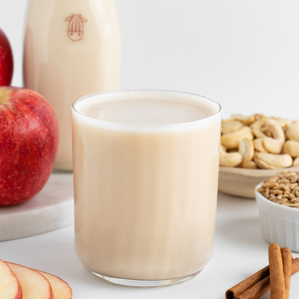 plant-based apple pie milk in a glass