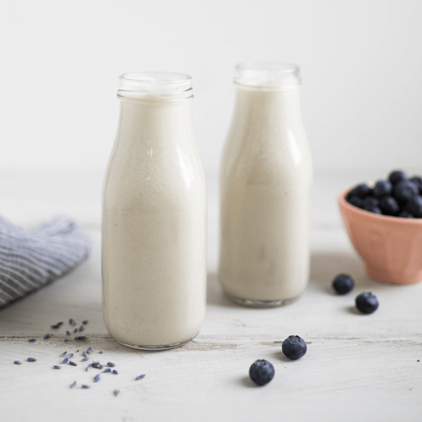 two glasses of blueberry lavender plant-based milk