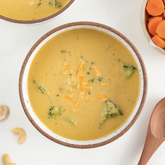 bowl of vegan broccoli cheddar soup