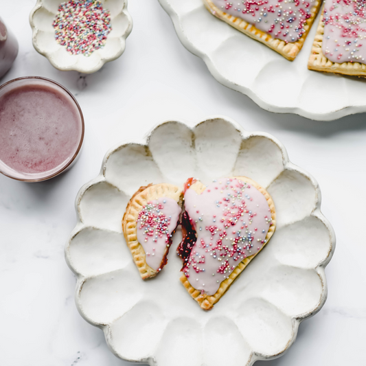 vegan heart shaped cherry hand pie on an plate