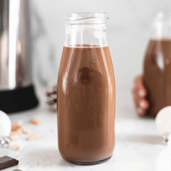 plant-based chocolate mousse milk in a glass bottle