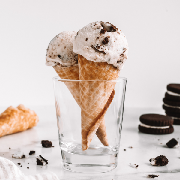 vegan ice cream in cones in a glass with oreos