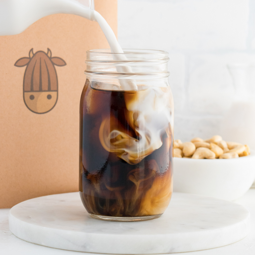 cashew mocha creamer being poured into coffee
