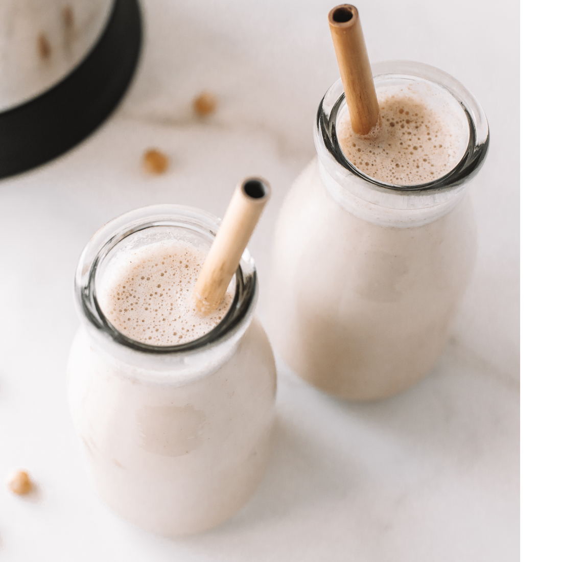homemade, plant-based, vegan Snickerdoodle Chickpea Milk in a glass with a straw