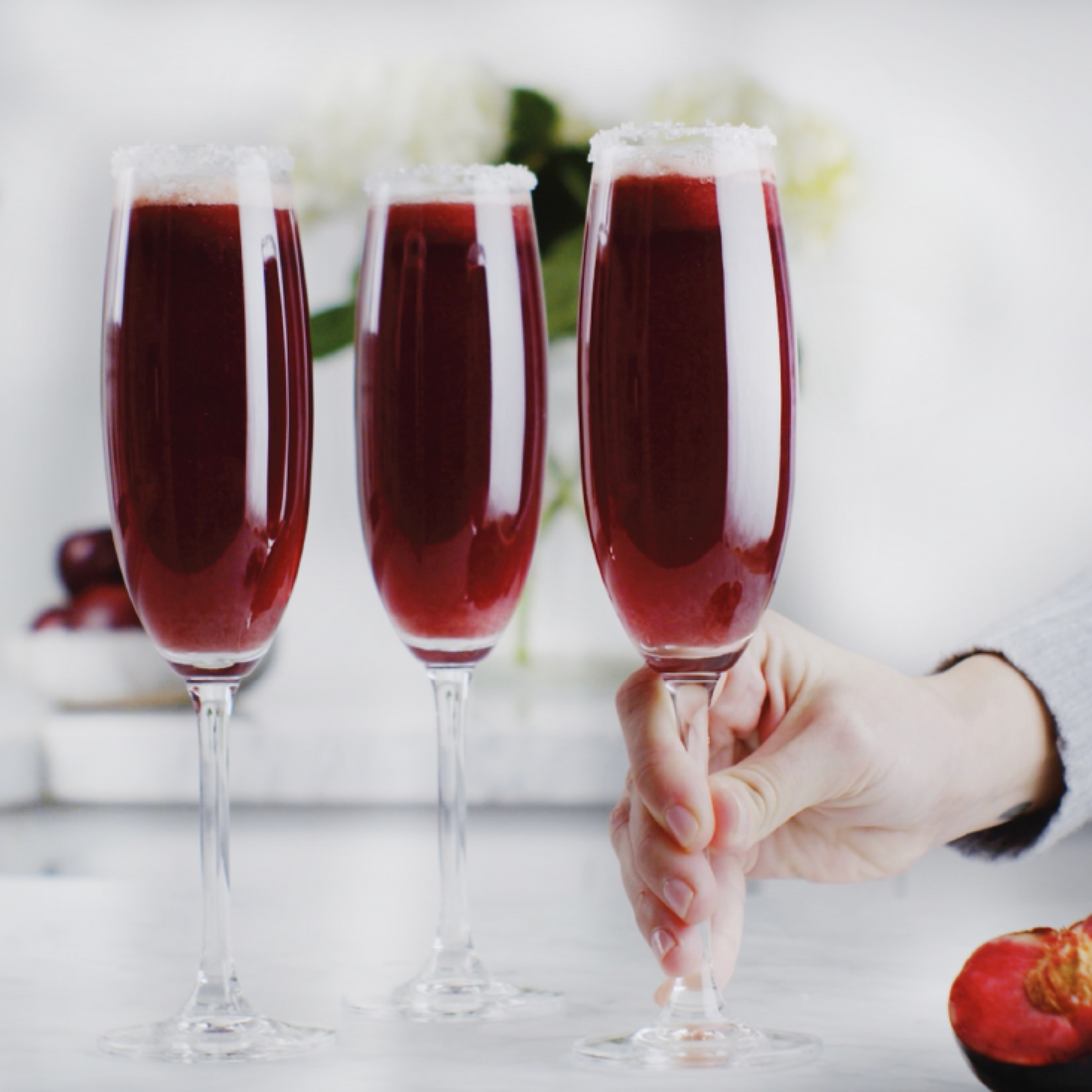 glasses of vegan sugar plum punch