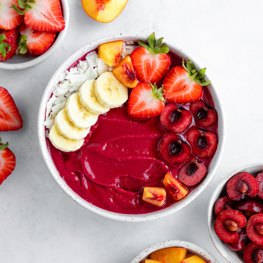Summer Fruit Smoothie Bowl with bananas, strawberries, cherries, and coconut