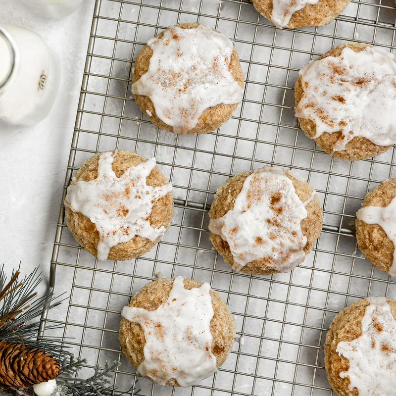 vegan eggnog cookies on a cooling rack