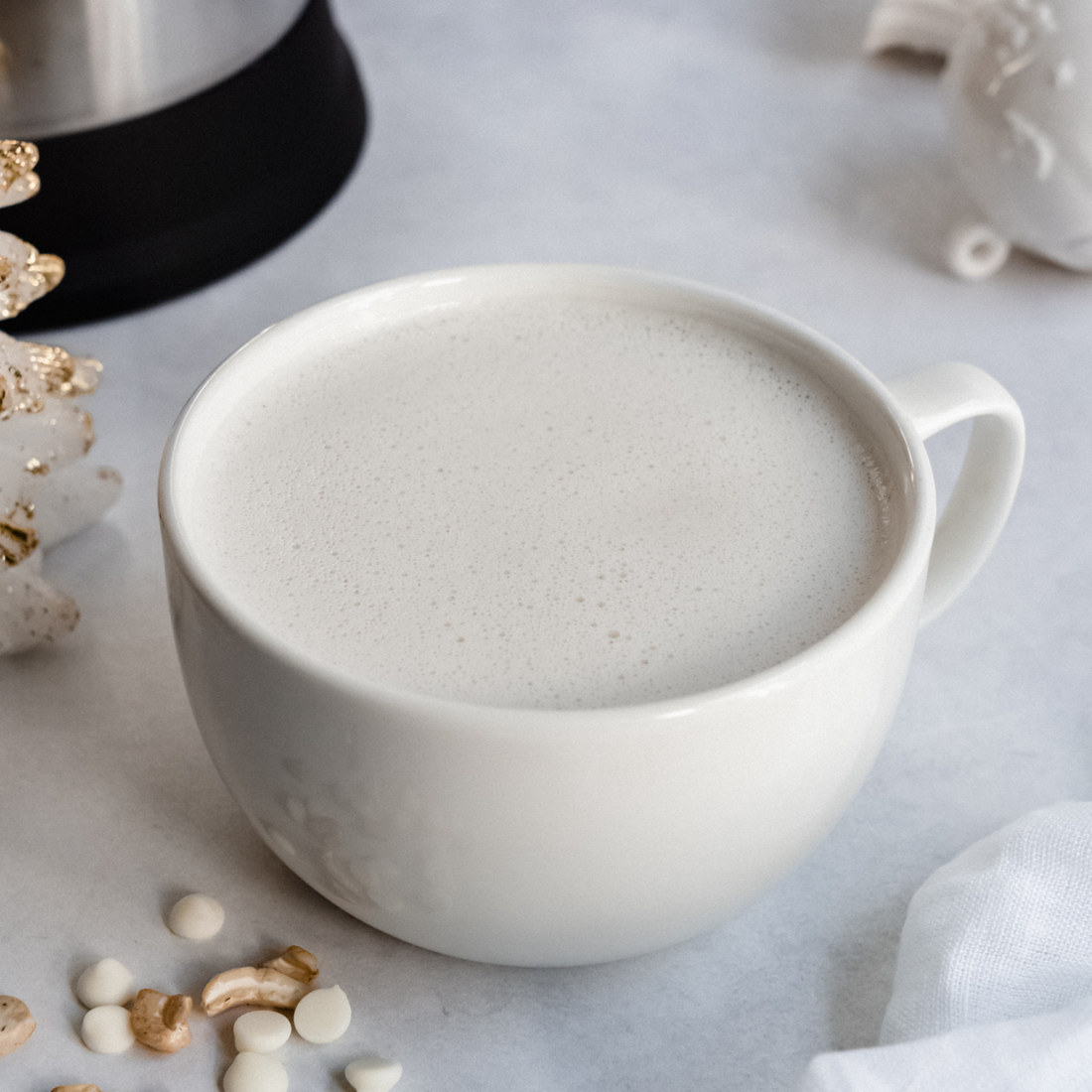 vegan white hot chocolate made in the Almond Cow