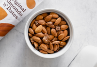 Pre-measured ingredients of Almonds 'n' Dates from Milk Medleys pack in a bowl to easily make delicious plant-based milk.