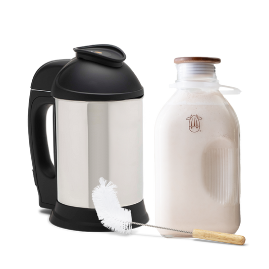 The Essentials Bundle, featuring the Almond Cow Milk Machine, Glass Jug, and Jug Brush for effortless plant-based milk making.